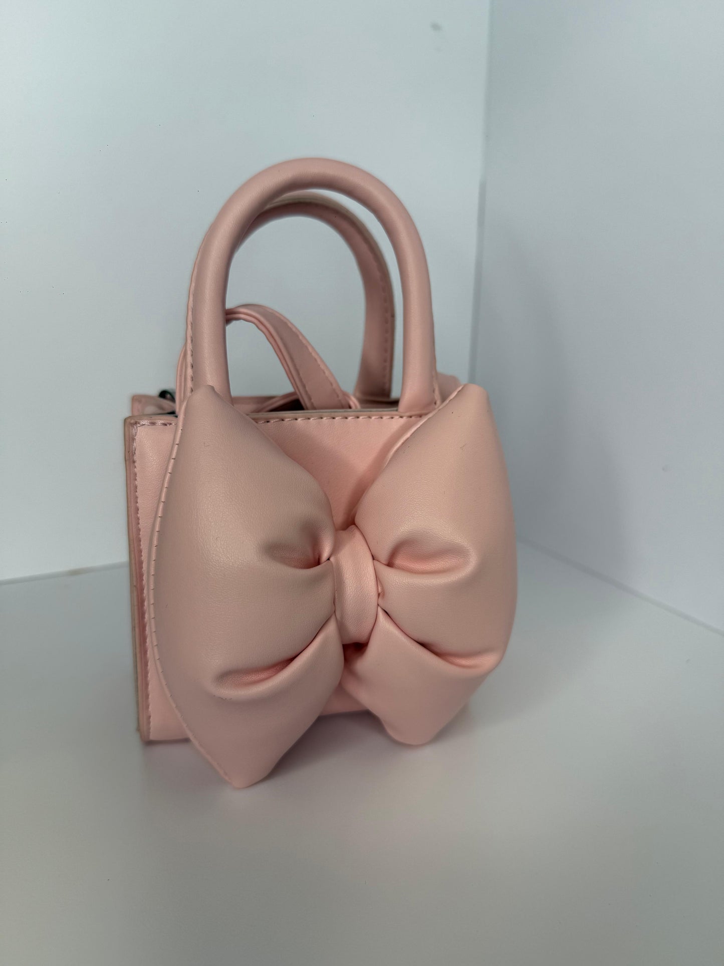 The bow mini purse
